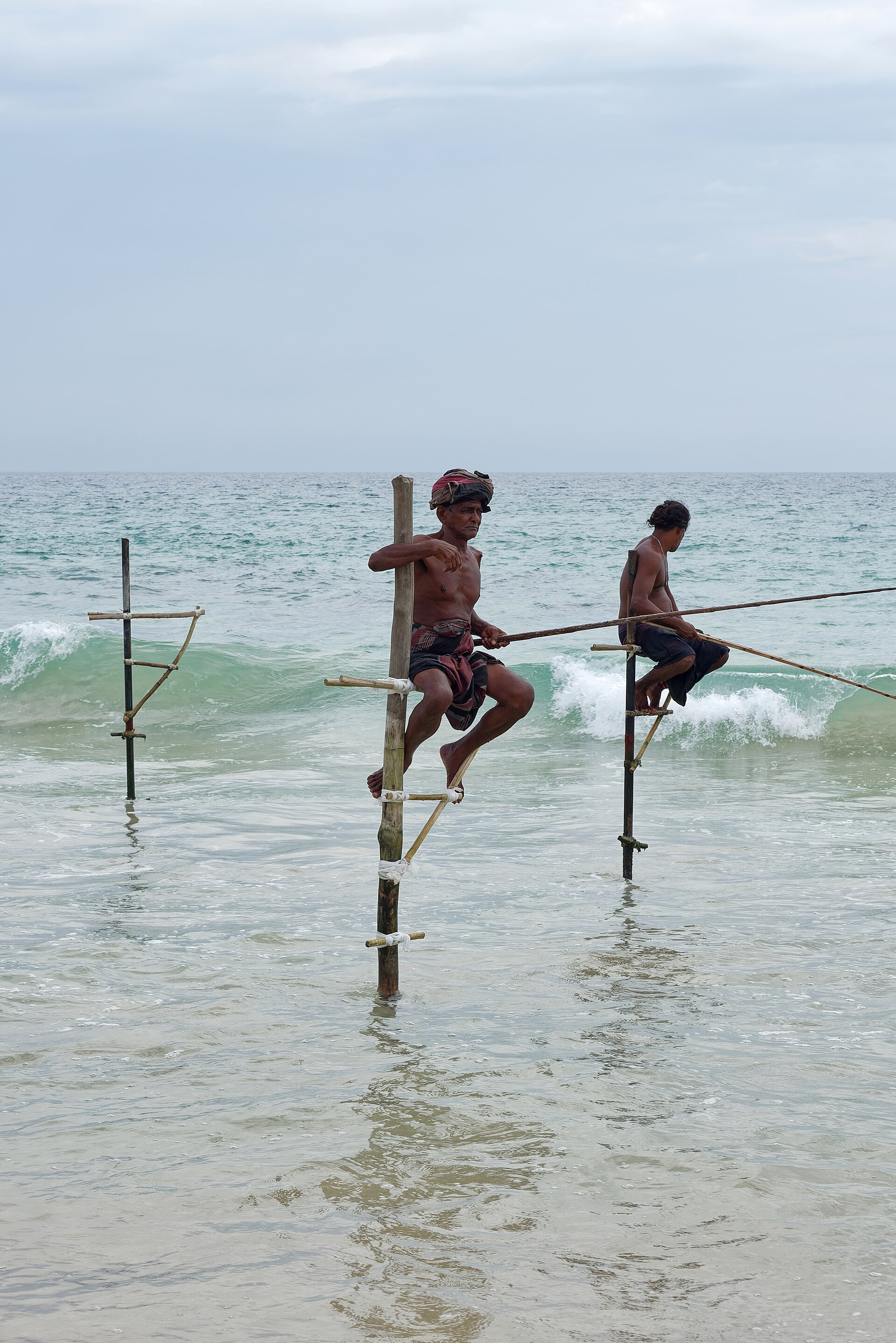 Traditional stilt fishermen near Koggala, southern Sri Lanka